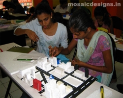  students working on a model
